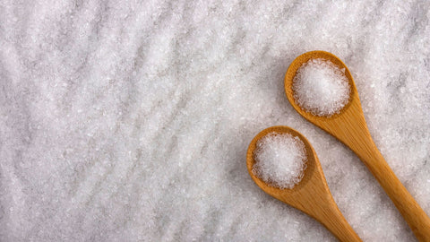 Wooden spoons with magnesium chloride powder