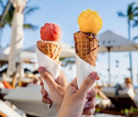 Strawberry Gelato and Mango gelato in cone