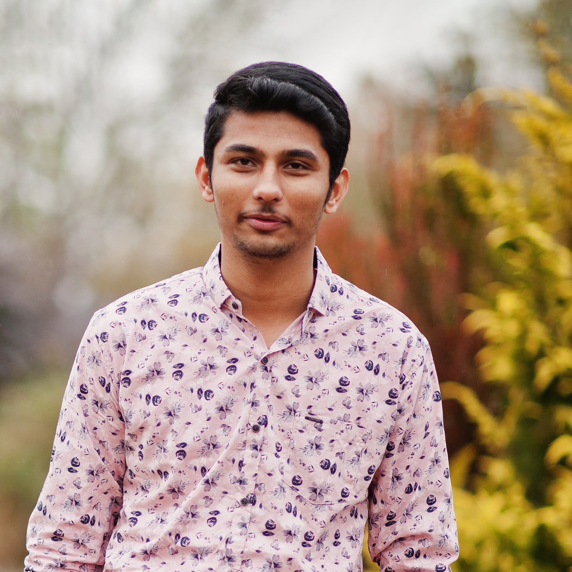 indian-man-student-shirt-posed-outdoor