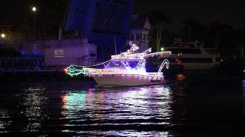 Boat decorated with Christmas lights at Pensacola Beach FL Lighted Boat Parade