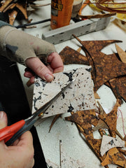 Cutting smaller triangles for the top of the tree