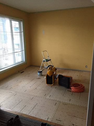 Multipurpose room after new subfloor installed over QuietCork.