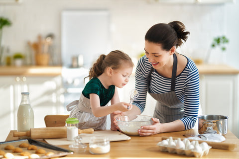 mother and daughters making spring no-bake recipes 