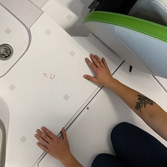 Customer testing paper fit templates for DIY SeaDek boat decking kit from USATuff.