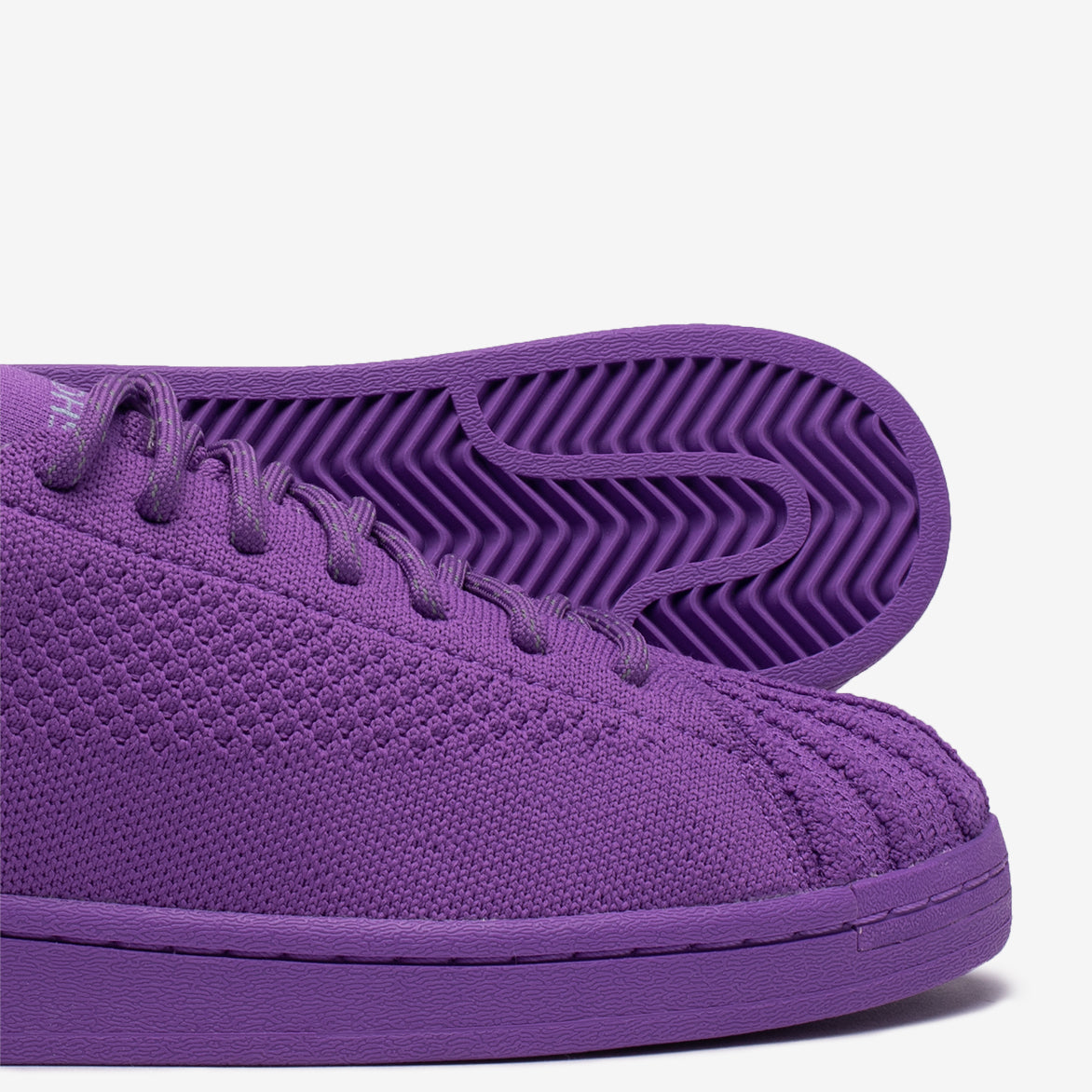 purple human race shoes