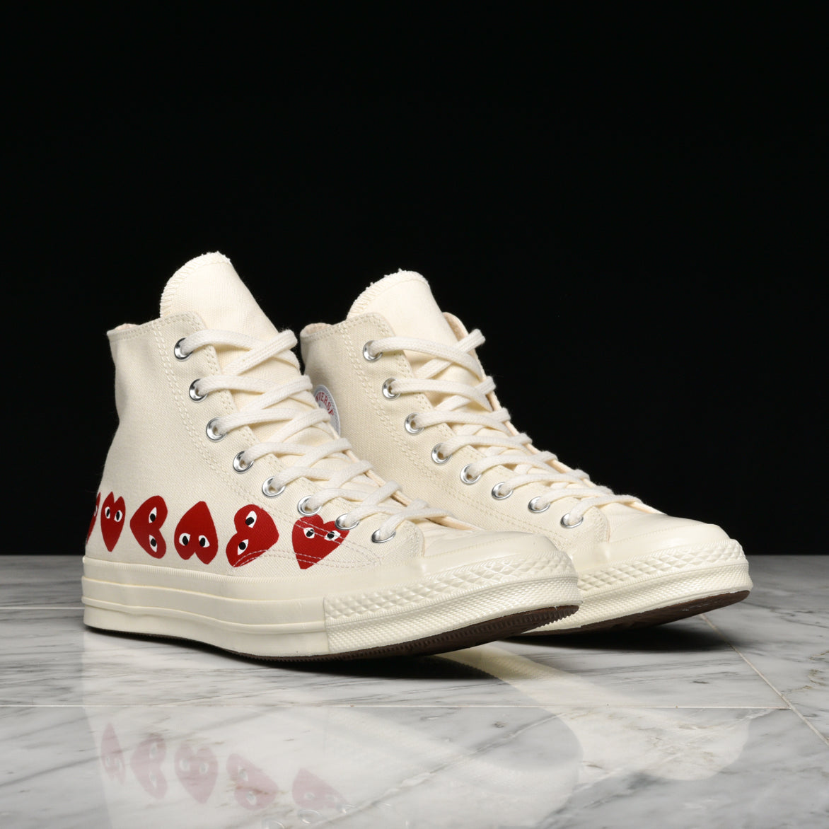 white high top converse with heart