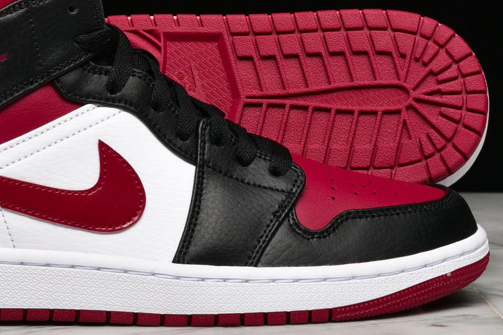 red black and white jordan 1