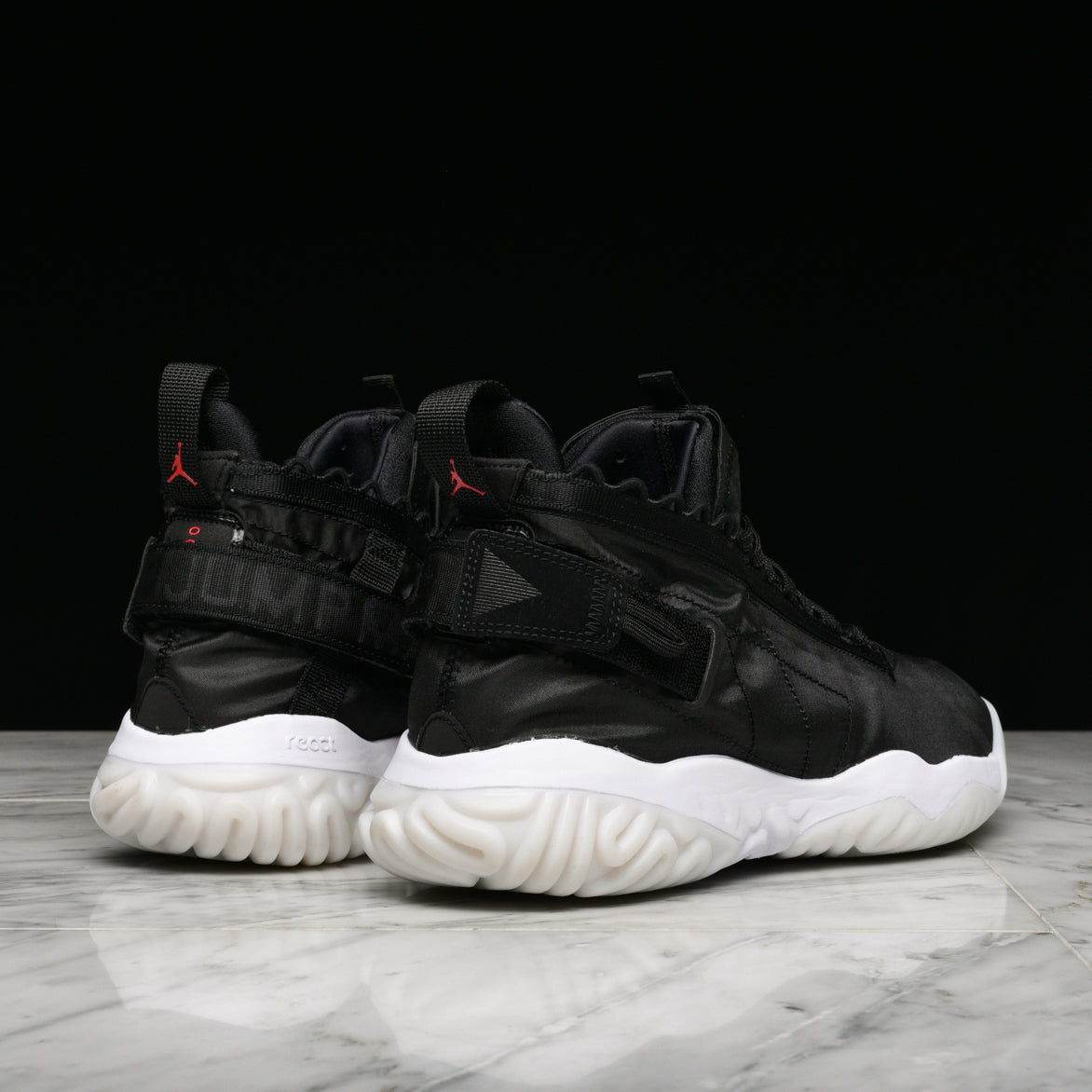 jordan proto react black white