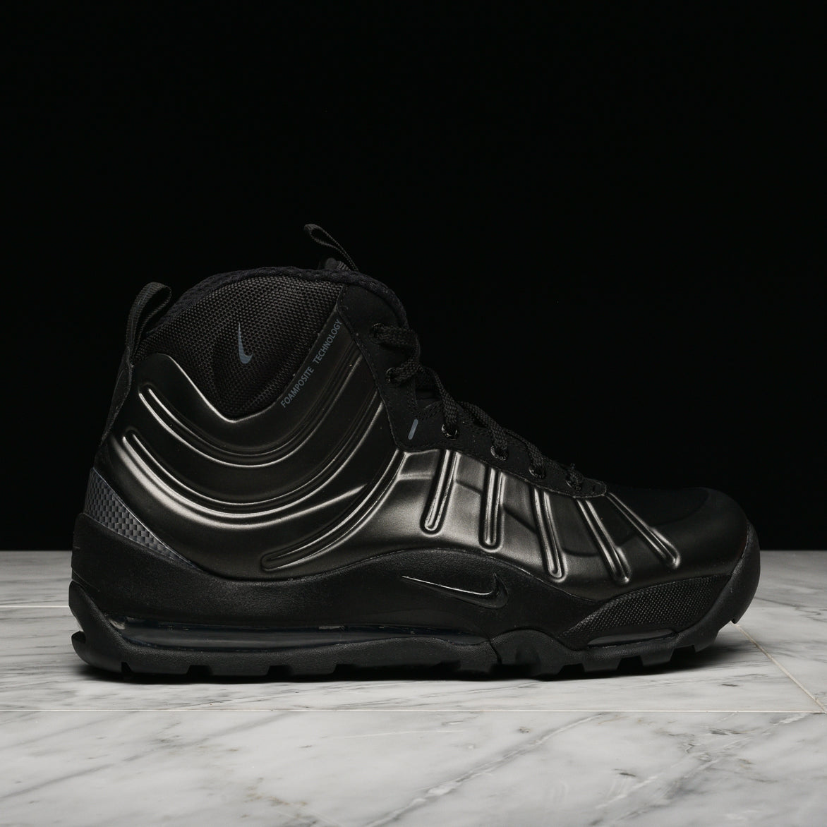 nike air bakin posite triple black