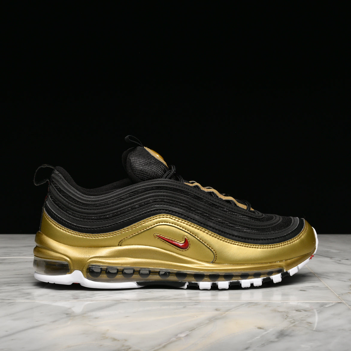 nike 97 gold and black