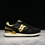 black and gold saucony