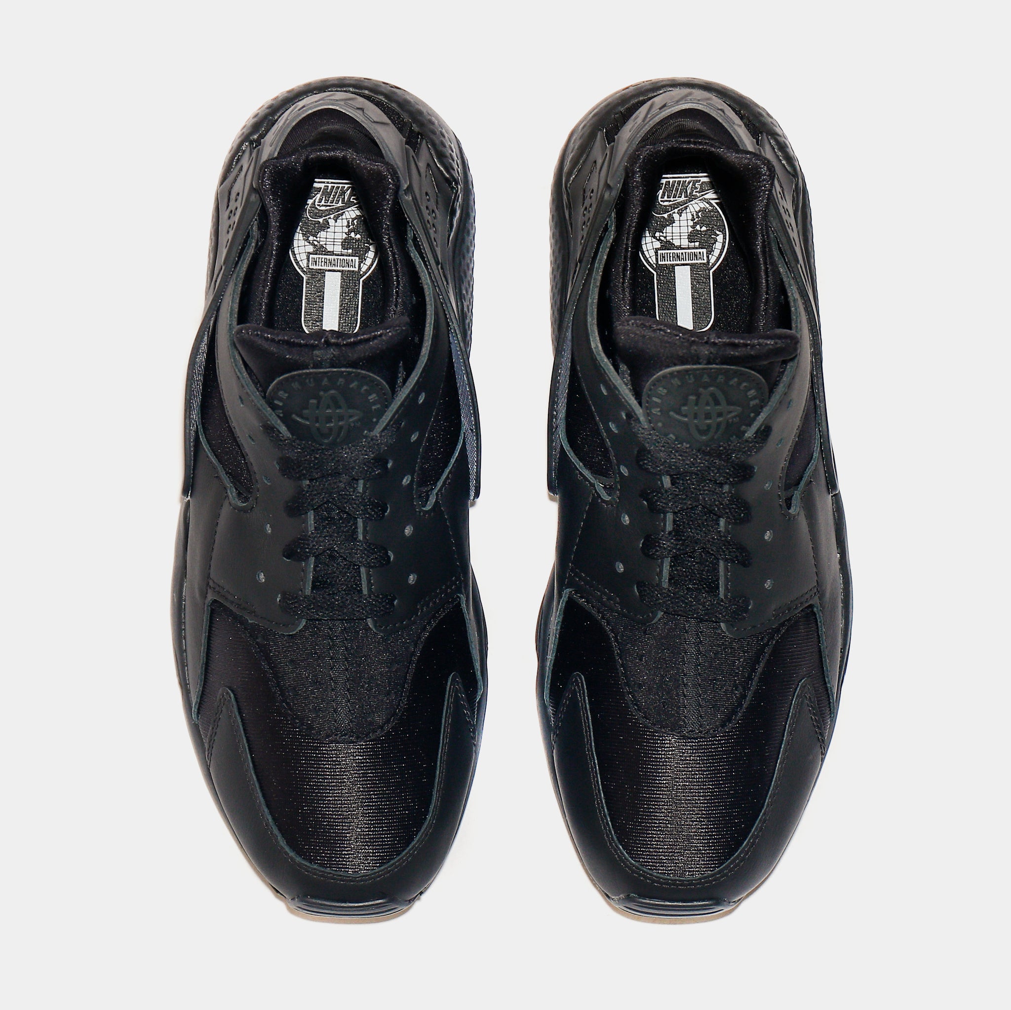 nike air huarache triple black mens