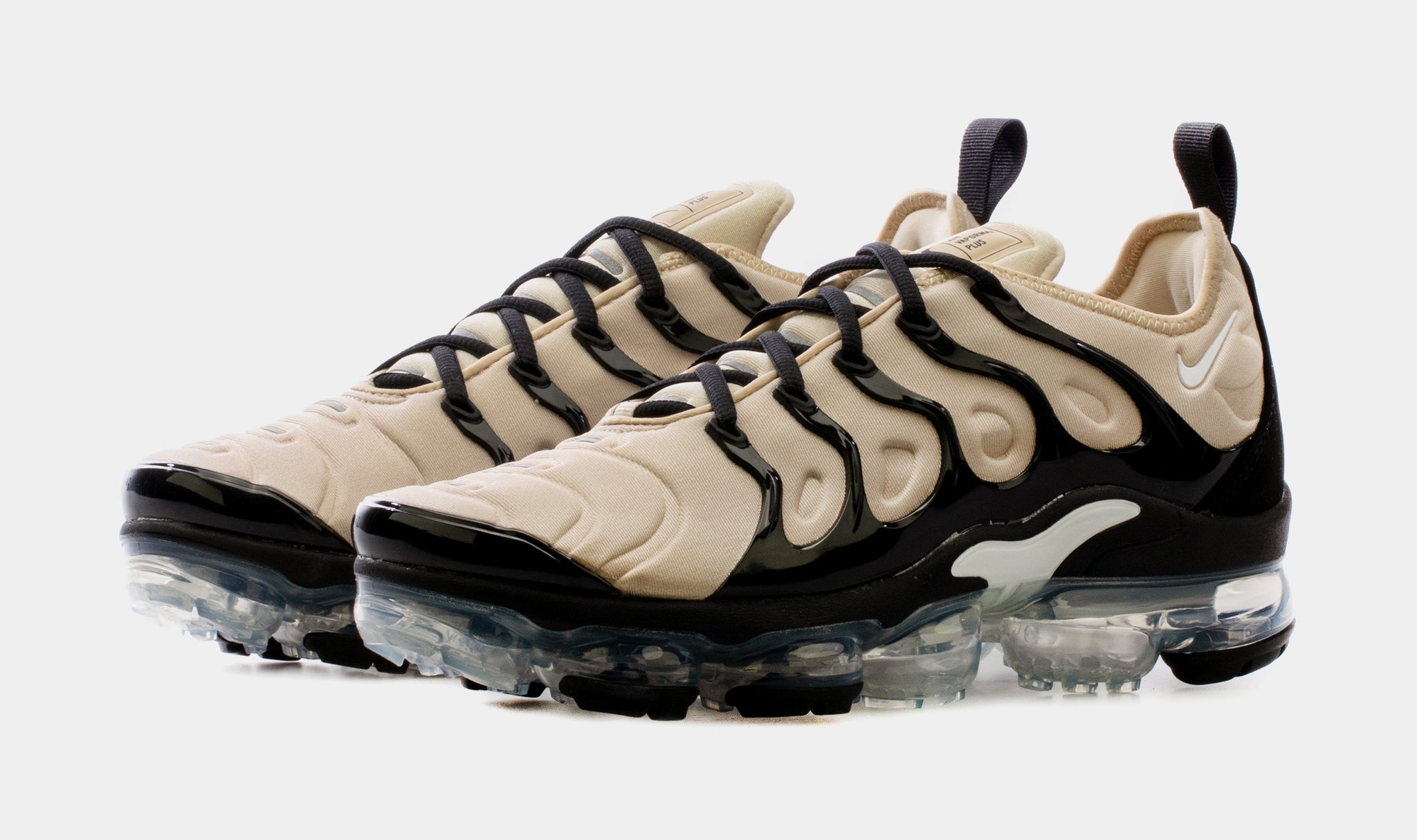 tan and black vapormax plus