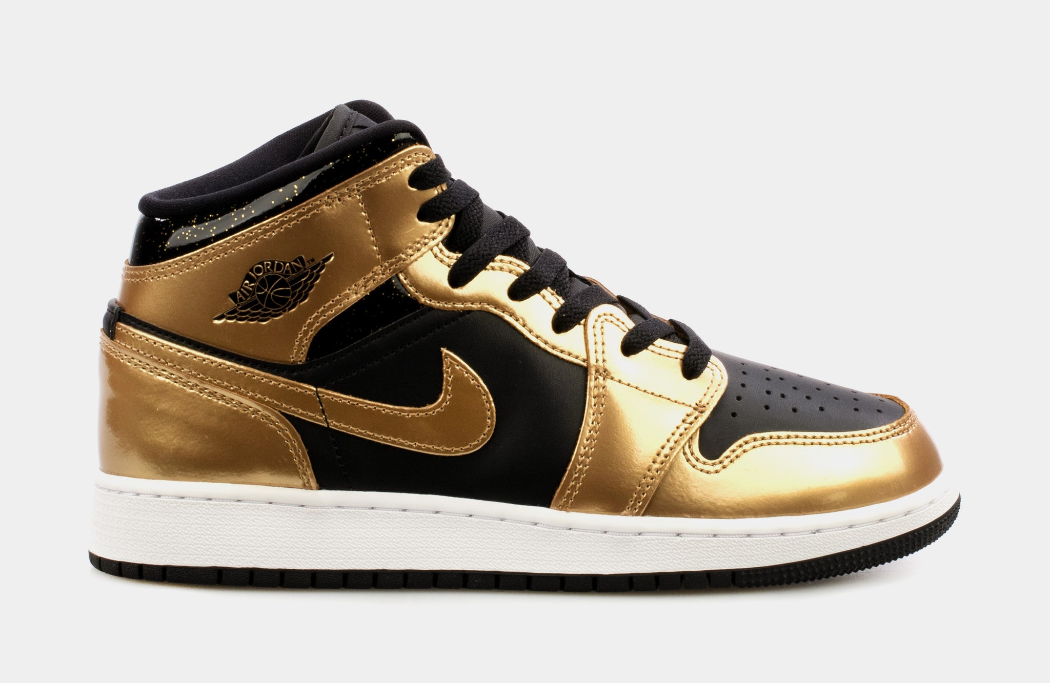 gold and black jordan 1 mid