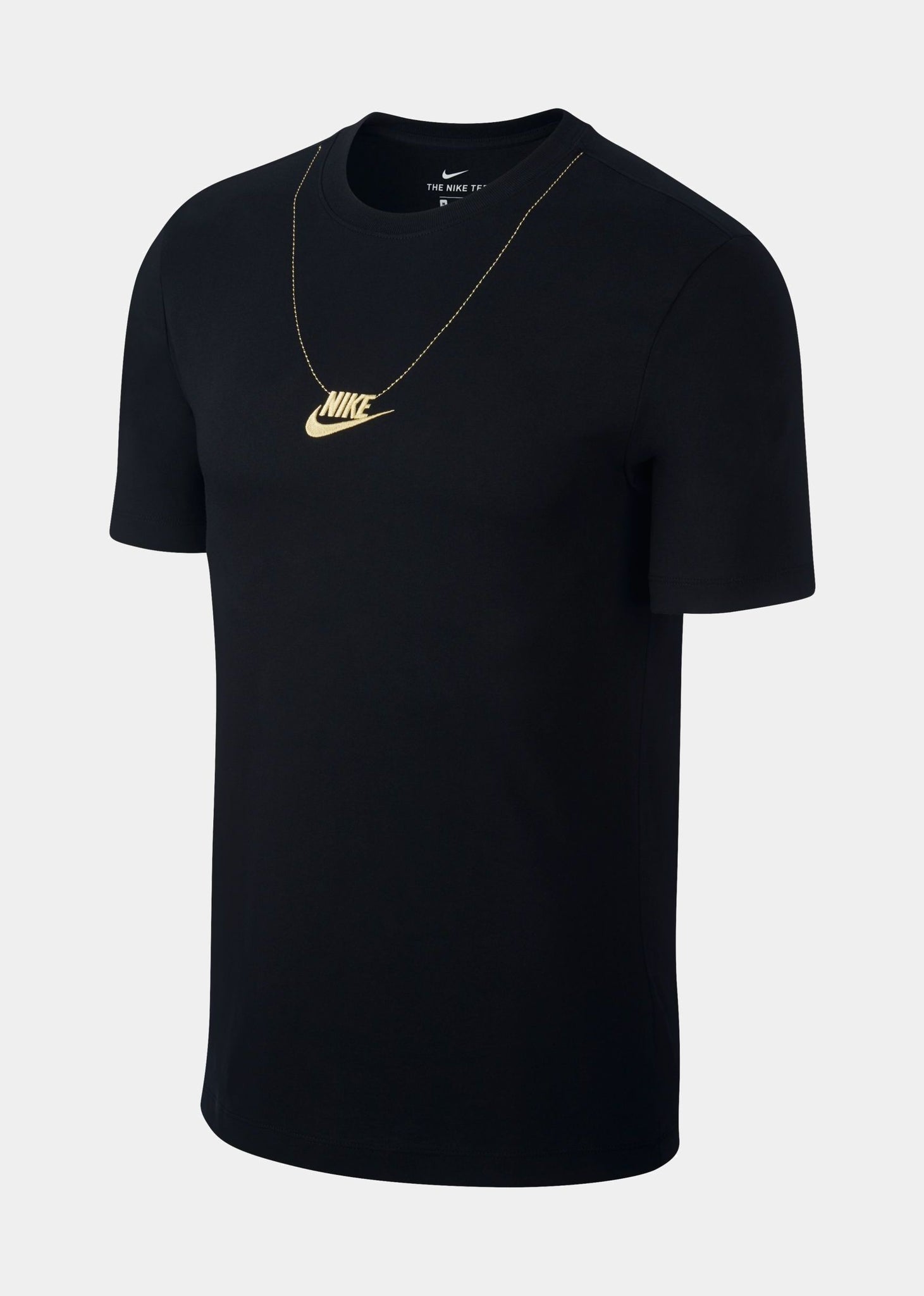 gold nike shirt