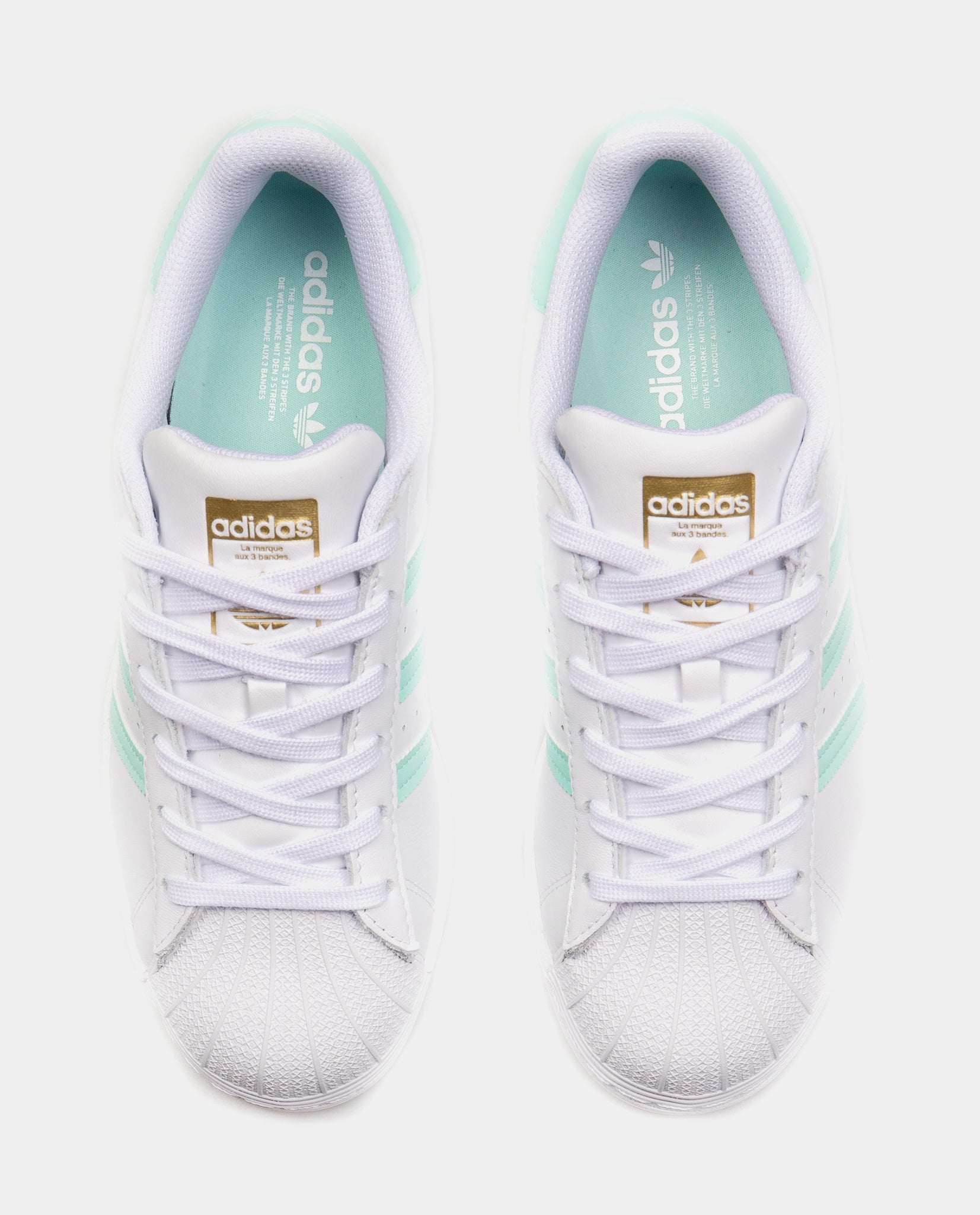 adidas white and mint green