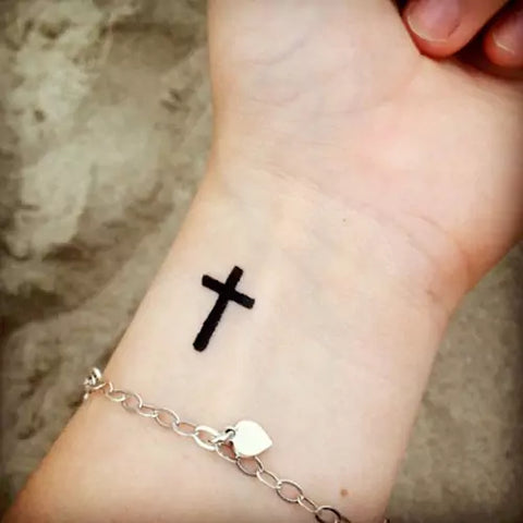 small cross tattoo