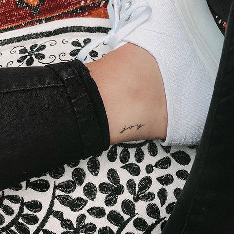 Small “Joy” Tattoo