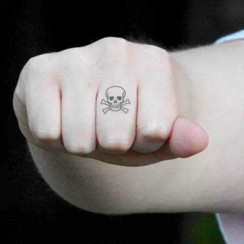 little skulls on wrist by Abes RIP: TattooNOW