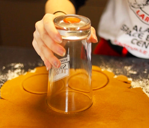 Cutting cookie cough with glass