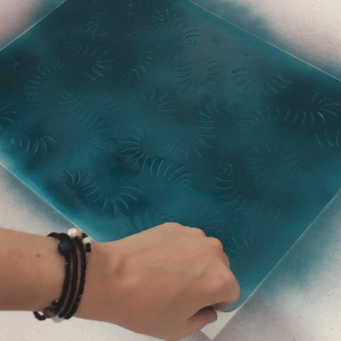 Peeling an adhesive stencil