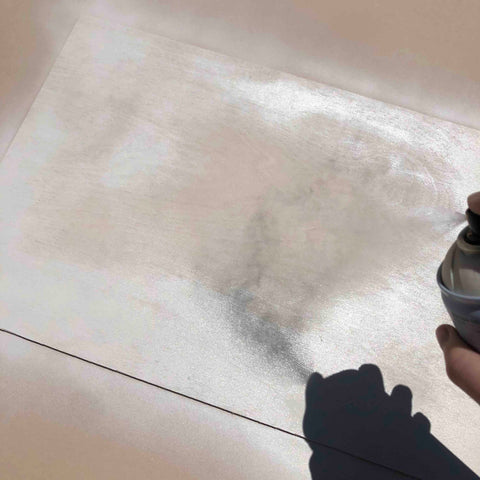 Spraying a white layer