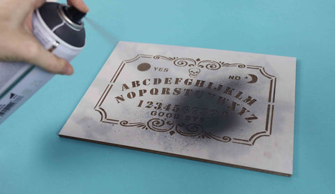 Spray painting Ouija board