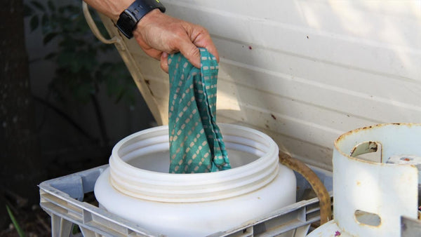 Using a pop-up bucket for washing.