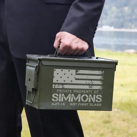 Man in suit carrying ammo can