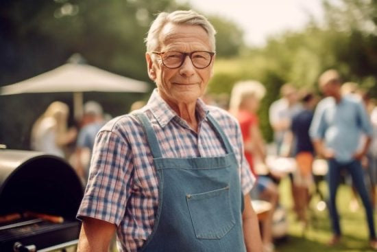 Retired man BBQing