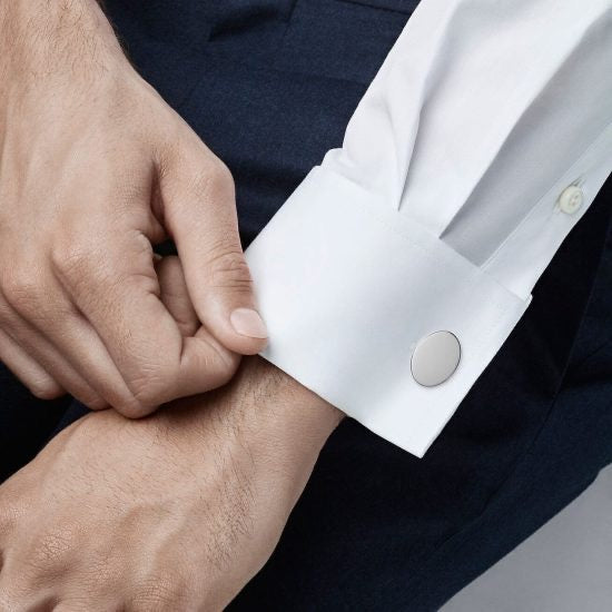 Tiffany's classic oval cuff links on man's dress shirt