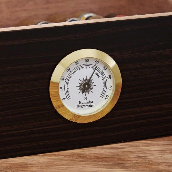 Zoom in of the hygrometer on the cigar humidor