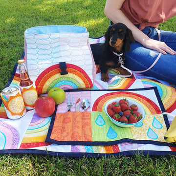 influencer and dog posing with sweet pea rainbow set