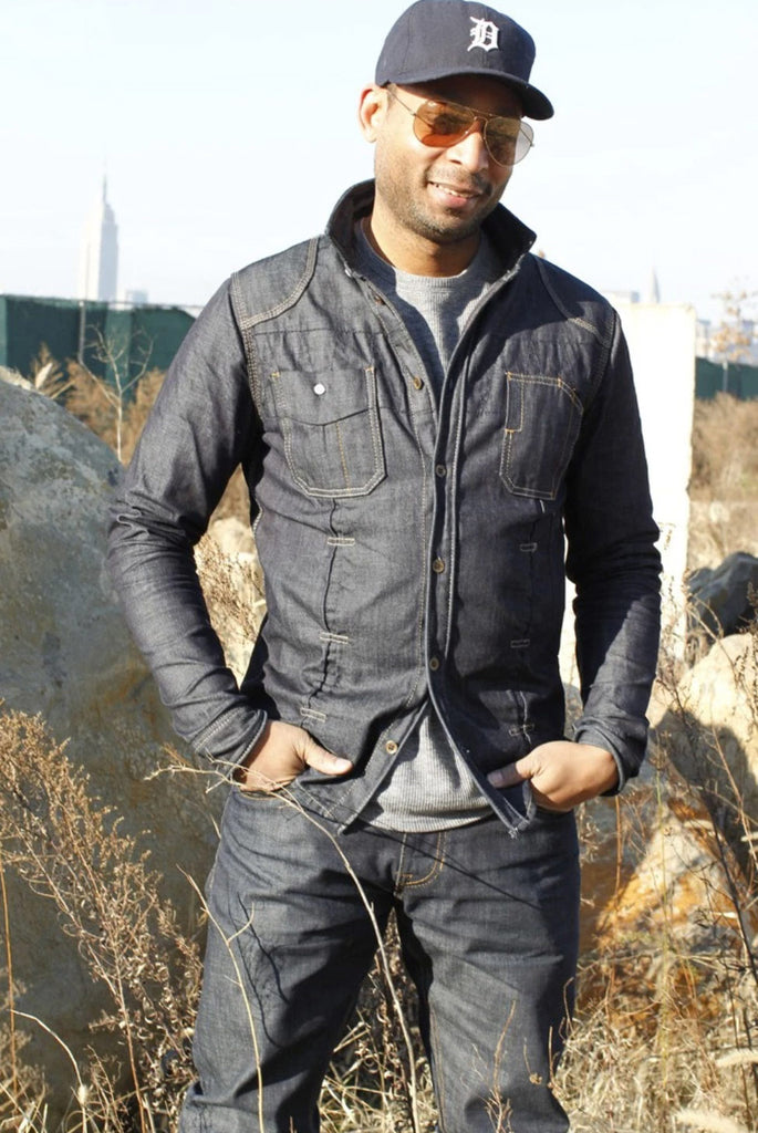 Maurice Malone, founder of Williamsburg Garment Company, poses in Williamsburg, Brooklyn, for a WWD newspaper article in January 2012. Williamsburg Garment Company, designer Maurice Malone's second black-owned denim business, debuted in 2011.