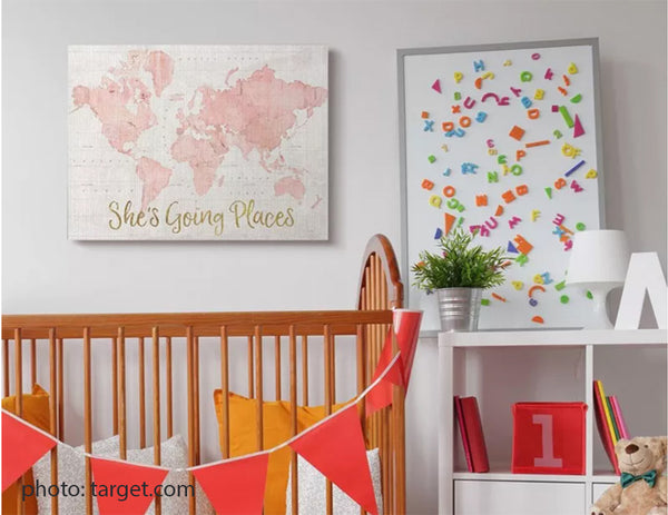 Map artwork in young child's bedroom with crib