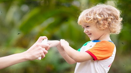 bug-spray-on-toddler