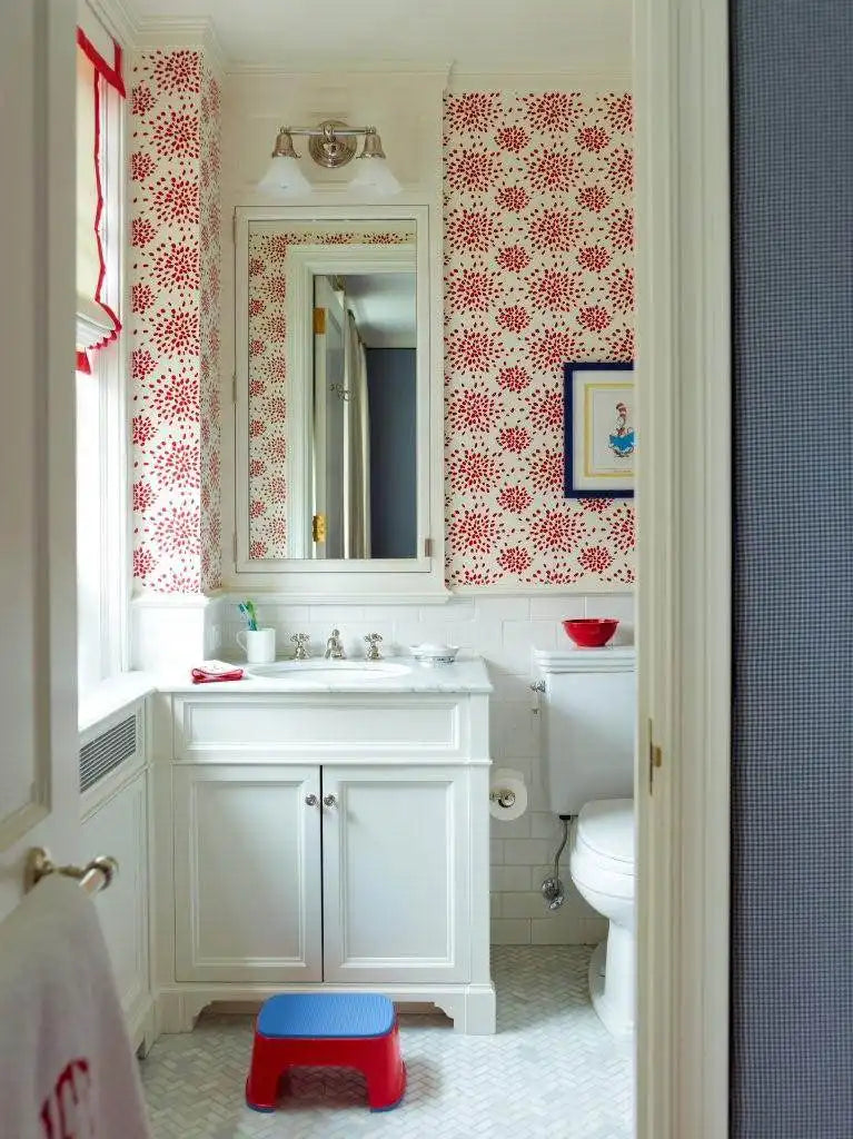 A charming bathroom with floral wallpaper and a classic white freestanding single bathroom vanity, perfect for a family-friendly space. | ACE DECOR