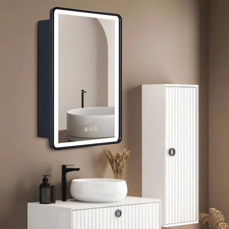 Framed medicine cabinet mirror with lights featuring LED border, defogger, and touch control.