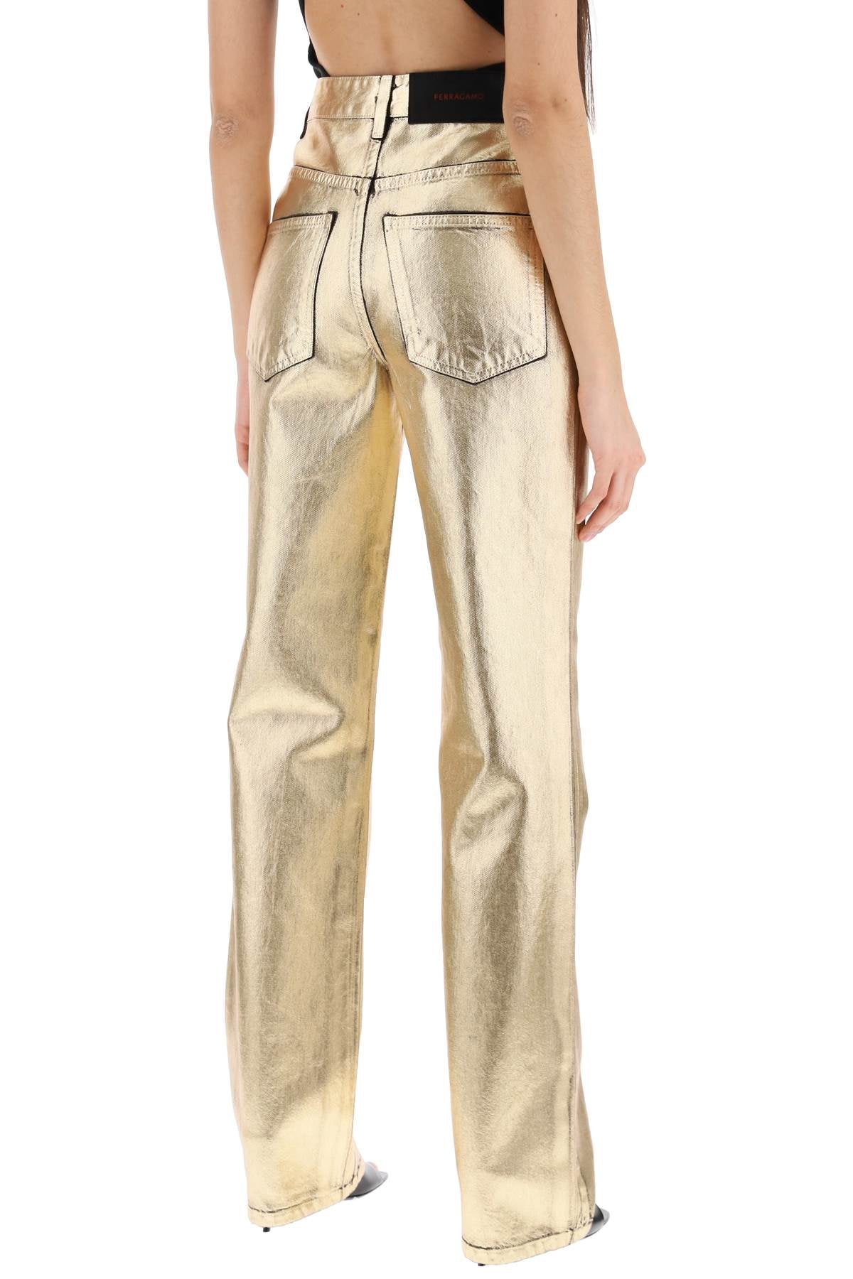 Shop Ferragamo High-waisted Laminated Denim Pants For Women In Gold