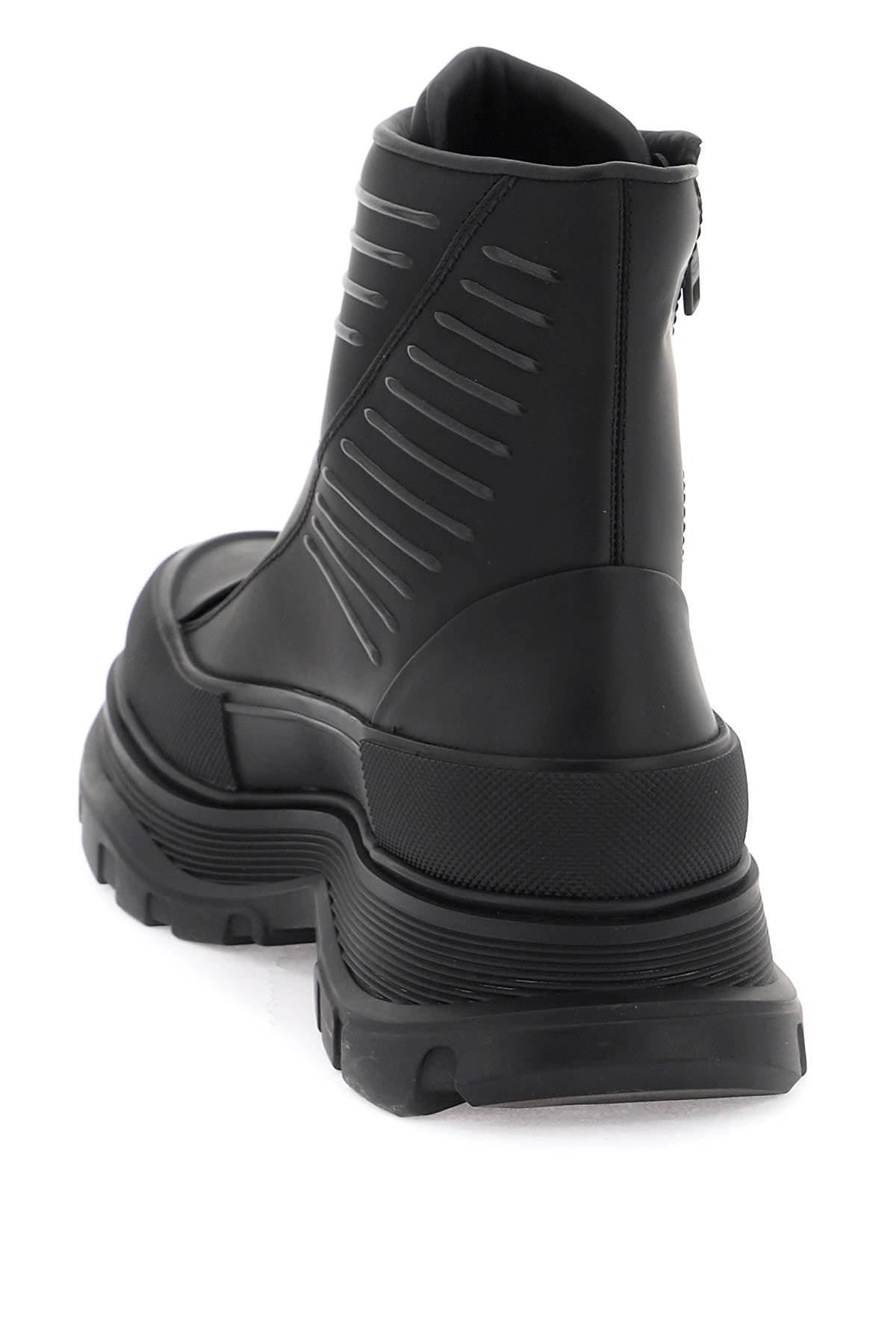 Shop Alexander Mcqueen Sleek Rubberized Ankle Boots For Men In Black