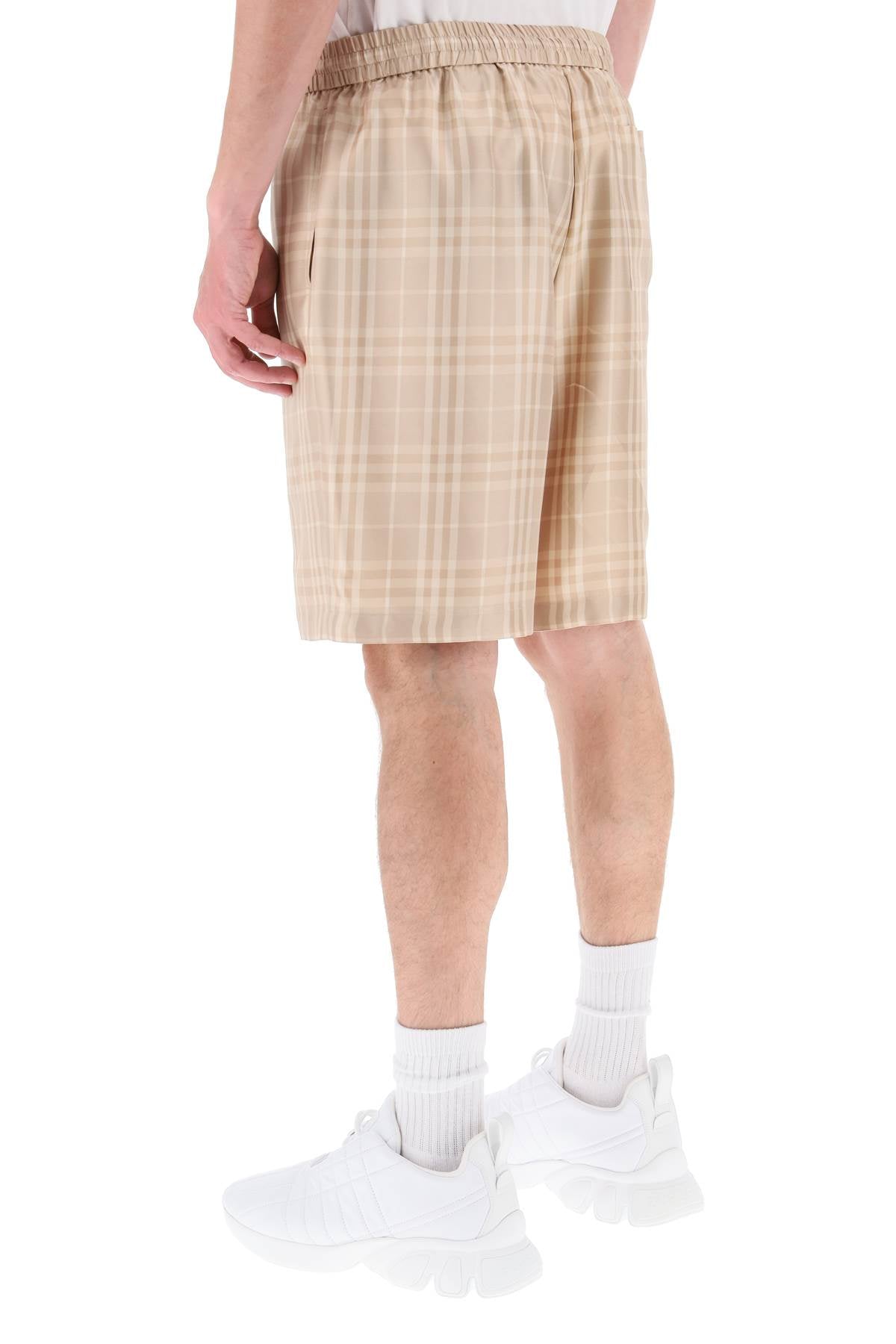 Shop Burberry Men's  Tartan Silk Shorts In Beige