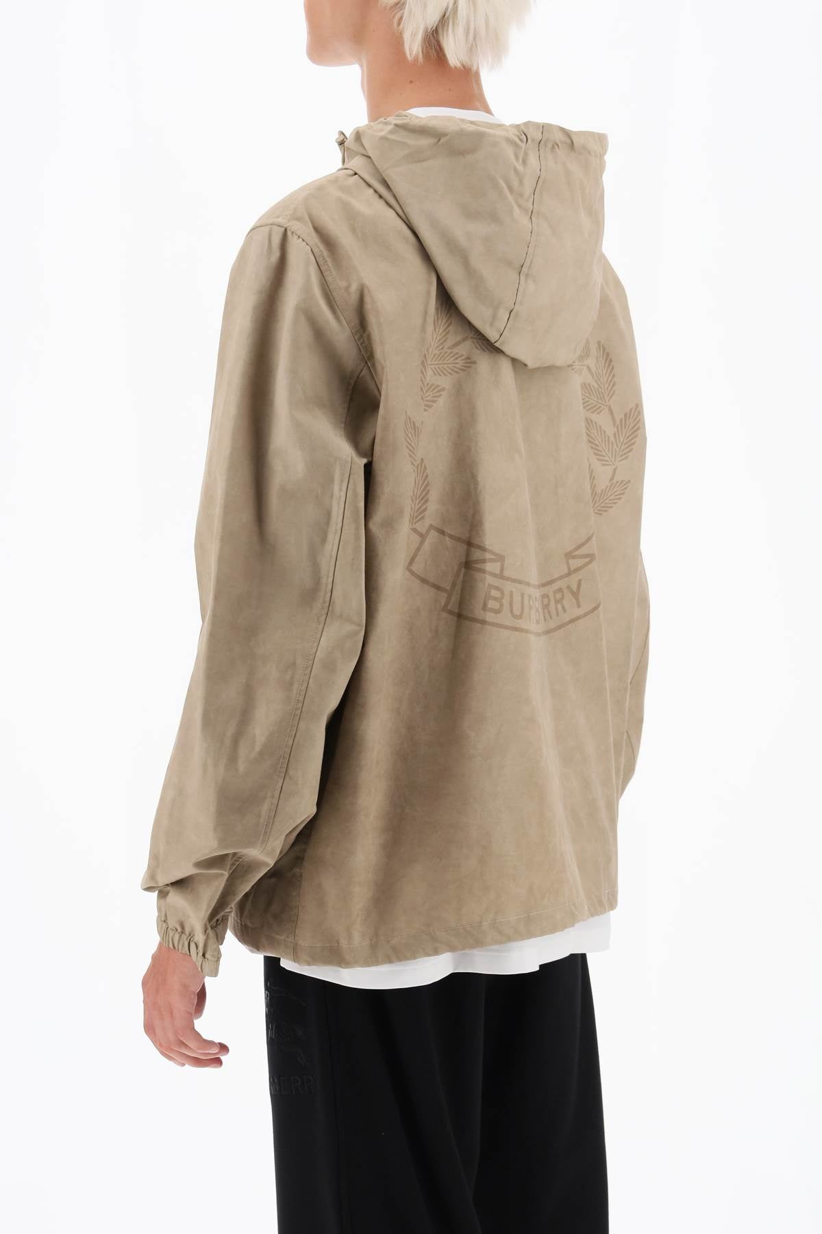 Shop Burberry Sporty Hooded Jacket With Ekd Motif And Adjustable Cuffs In Beige