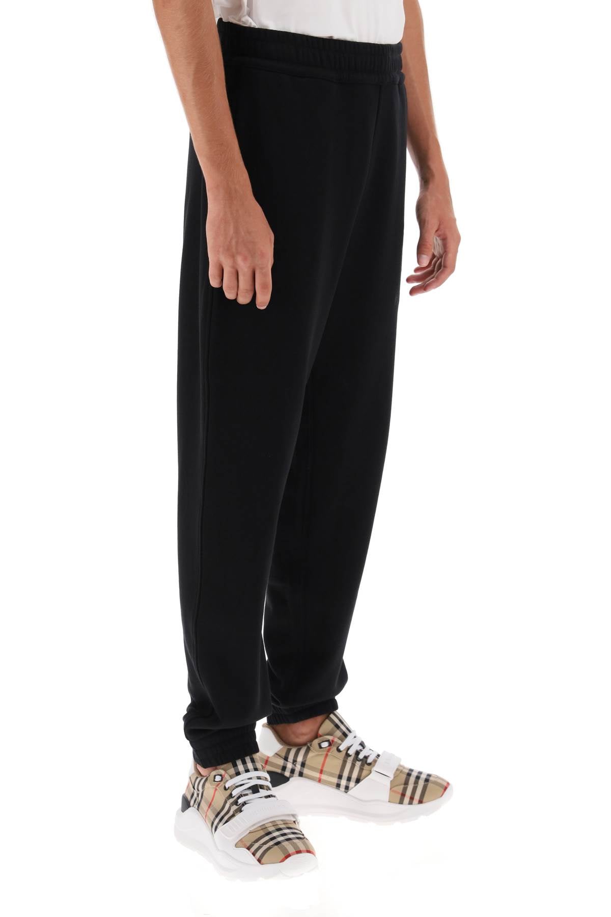 Shop Burberry Black Loose-fit Sweatpants With Ekd Embellishment