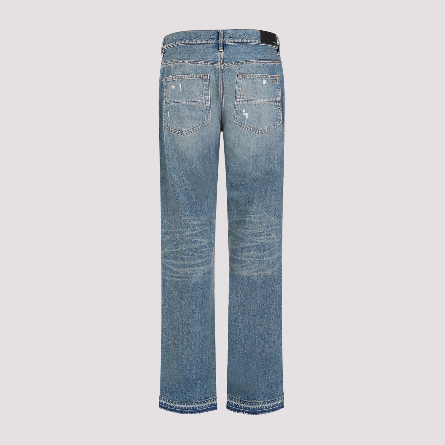 Shop Amiri Medium-washed Distressed Jeans For Men In Blue