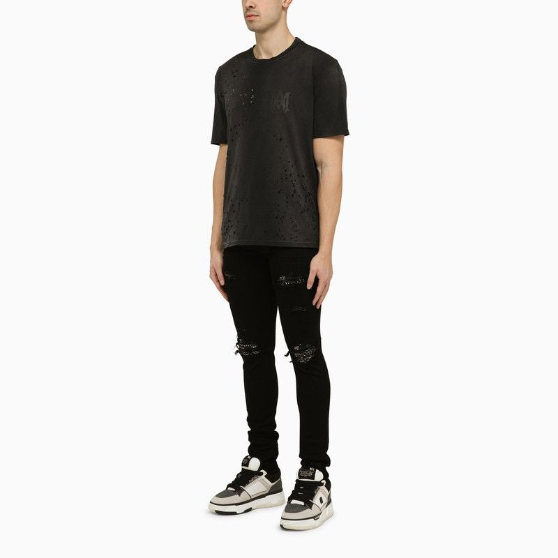 Shop Amiri Men's Black Skinny Jeans With Camouflage Patches For Ss24