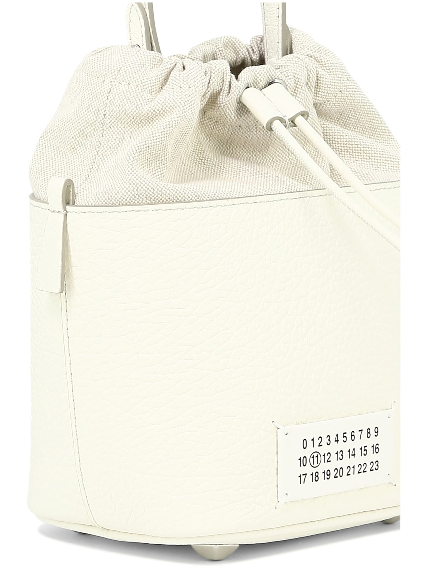 Shop Maison Margiela Classic White Bucket Bag With A Chic Twist