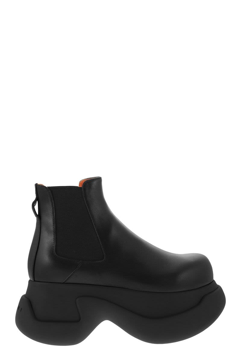 Shop Marni Ultra-thick Rubber Chelsea Boot For Women In Black