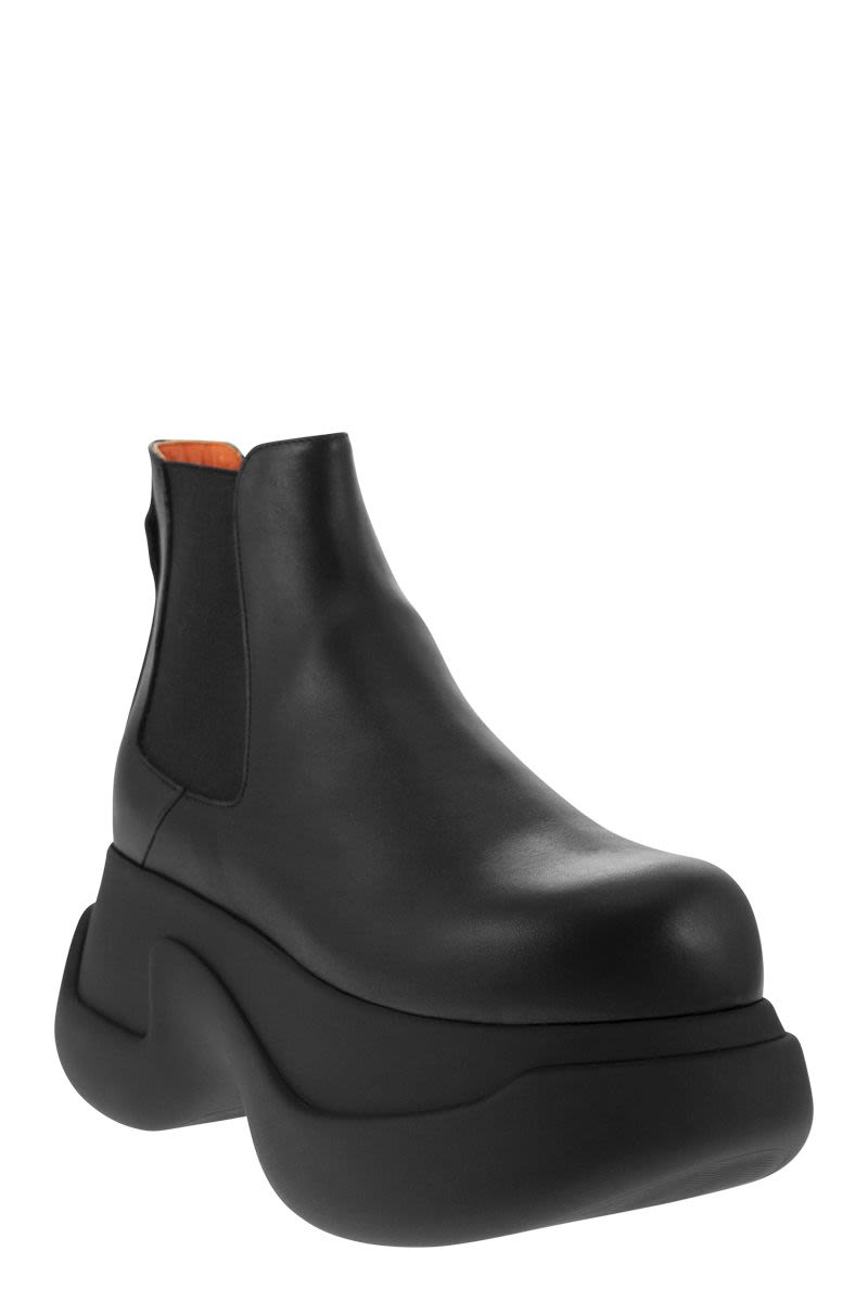 Shop Marni Ultra-thick Rubber Chelsea Boot For Women In Black