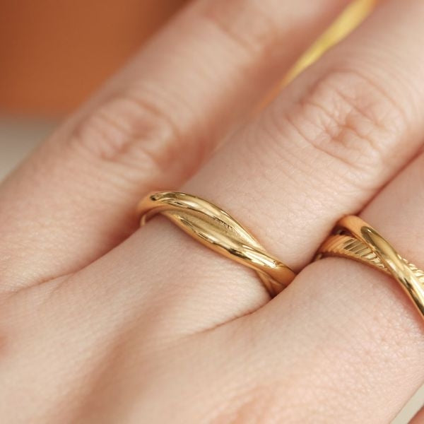18K Gold PVD Twist Ring and Slight Twist Ring, a set of exquisite and versatile rings, adds a touch of luxury to your daughter-in-law's jewelry collection.