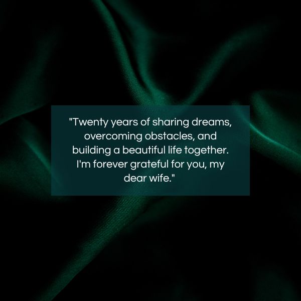 Silky folds of fabric backdrop with the quote "Twenty years of sharing dreams, overcoming obstacles, and building a beautiful life together. I'm forever grateful for you, my dear wife."